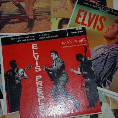 Sale Photo Thumbnail #372: Elvis Presley blue suede shoes,, cardboard sleeve and 45 record. 
Elvis Presley Hound Dog paper sleeve jacket and the 45 record 
Elvis SO Glad Your Mine cardboard sleeve and  =45 record 
two records without the sleeves 45's Thats All right &Elvis Presley 