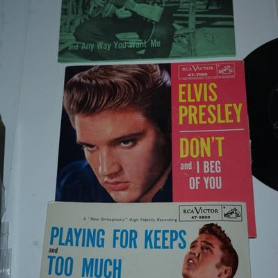 Sale Photo Thumbnail #373: Elvis Presley blue suede shoes,, cardboard sleeve and 45 record. 
Elvis Presley Hound Dog paper sleeve jacket and the 45 record 
Elvis SO Glad Your Mine cardboard sleeve and  =45 record 
two records without the sleeves 45's Thats All right &Elvis Presley 