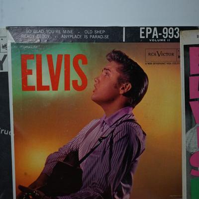 Sale Photo Thumbnail #378: Elvis Presley blue suede shoes,, cardboard sleeve and 45 record. 
Elvis Presley Hound Dog paper sleeve jacket and the 45 record 
Elvis SO Glad Your Mine cardboard sleeve and  =45 record 
two records without the sleeves 45's Thats All right &Elvis Presley 
