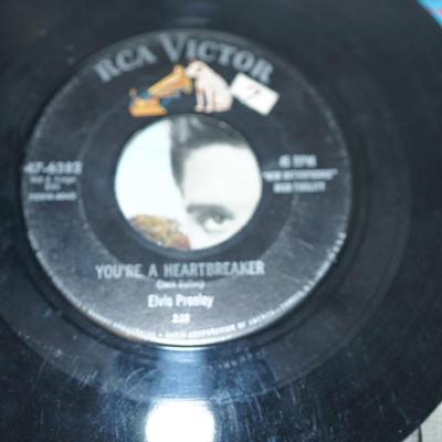 Sale Photo Thumbnail #376: Elvis Presley blue suede shoes,, cardboard sleeve and 45 record. 
Elvis Presley Hound Dog paper sleeve jacket and the 45 record 
Elvis SO Glad Your Mine cardboard sleeve and  =45 record 
two records without the sleeves 45's Thats All right &Elvis Presley 