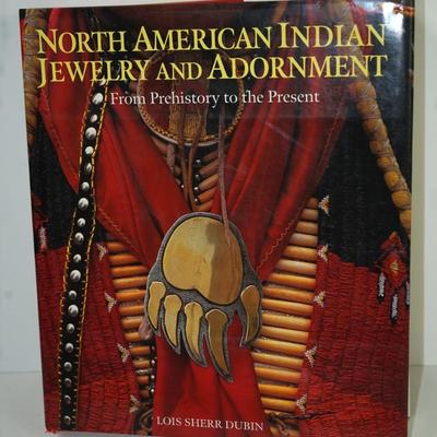 Sale Photo Thumbnail #390: NORTH AMERICAN INDIAN JEWELRY AND ADORNMENT 
LPOIS DUBIN 
PAGES 604
GOOD CONDITION WITH DUST JACKET
10" BY 11 1/2" BY 2"