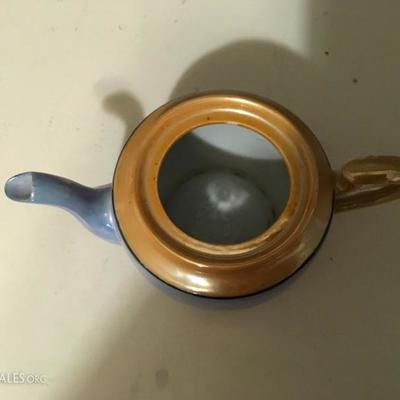 Teapot and Saucer Set
