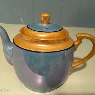 Teapot and Saucer Set