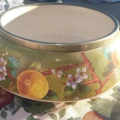 Beautiful vintage bowl with fruit paint around.