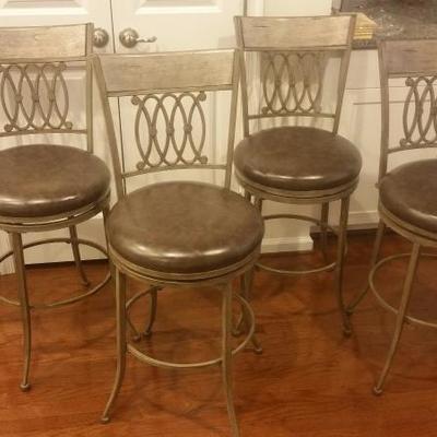 Set of 4 swivel bar stools with faux leather cushions