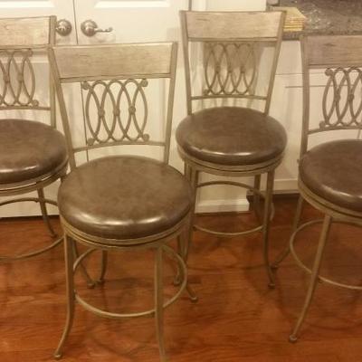 Set of 4 swivel bar stools with faux leather cushions