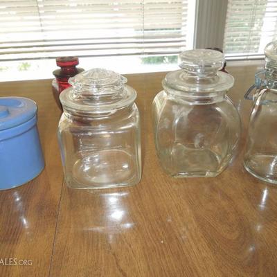 Lot of Colorful Small Covered Glass Jars and Pottery Crocks