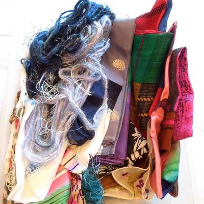 11x16 Plastic Tote Full of Silk and Knit Scarves