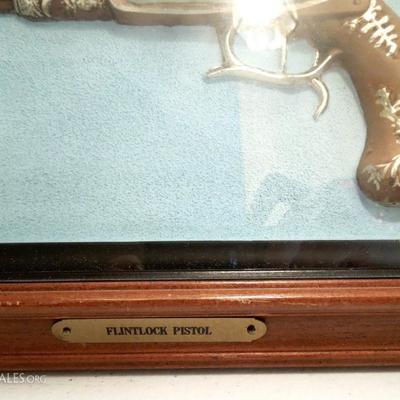 Three Wall Shadow Boxes of Flintlock Pistols