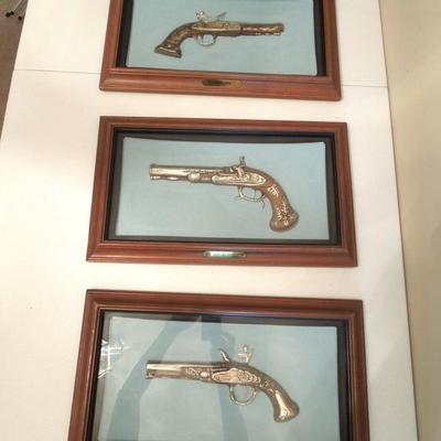 Three Wall Shadow Boxes of Flintlock Pistols