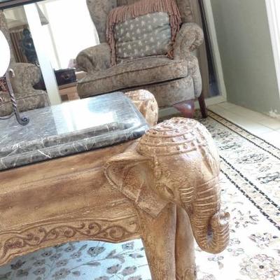 Marble top, carved wood cocktail table