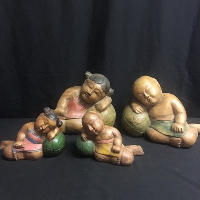 Lot 102 -  Snoozing Wood Carved People