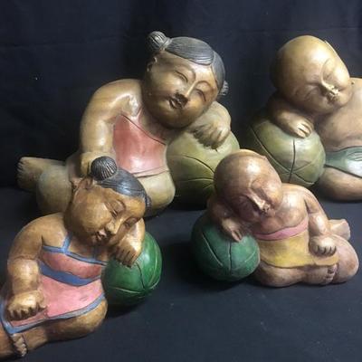 Lot 102 -  Snoozing Wood Carved People
