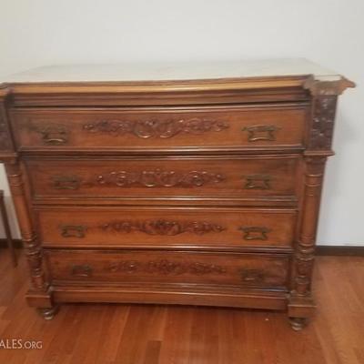 Lot-17 Antique Four Drawer Carved Walnut Chest W/ Marble Top
