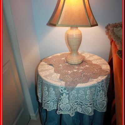 Draped wooden 3 leg table & lamp as pictured - Lot 207