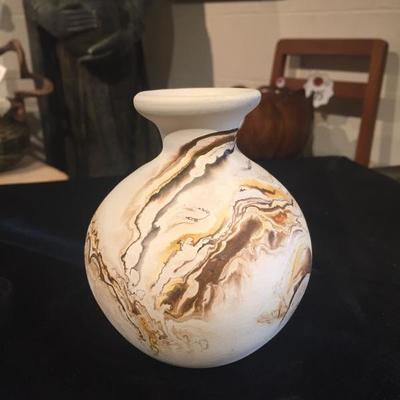 Vintage pottery vase with swirled colors