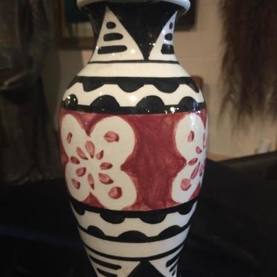 Hand painted designs pomogranate like and black patterns 