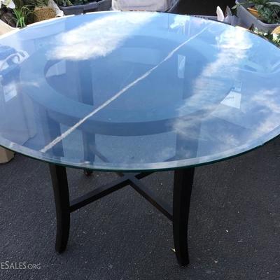 Round Glass black stand dining table 