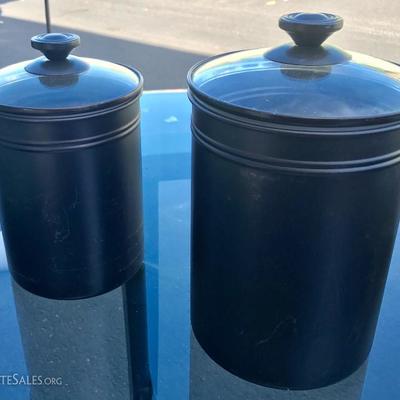 2 metal containers with glass lids 