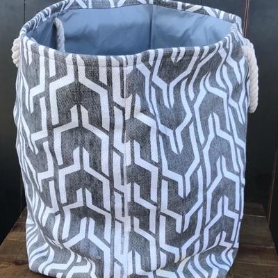Grey and white laundry bag