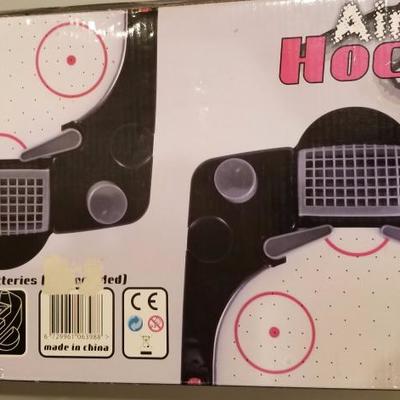 Air Hockey desk-top game runs on C batteries