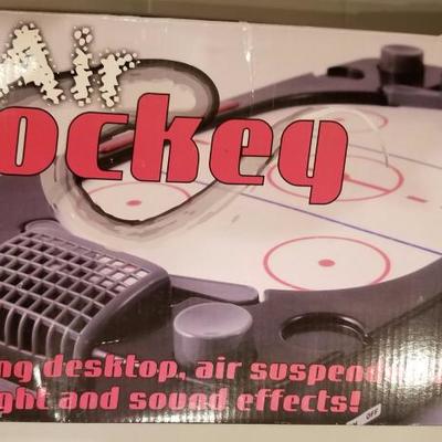 Air Hockey desk-top game runs on C batteries