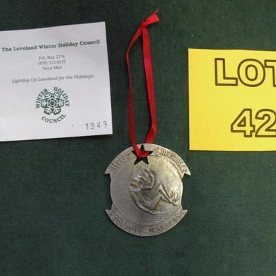 LOT 42 - Collectible Pewter Christmas Ornament by Jack Kreutzer