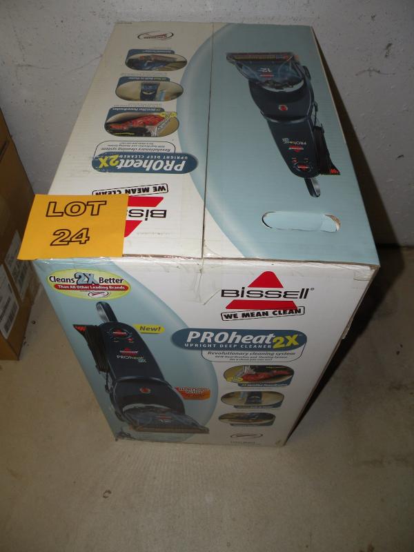 LOT 24 - NEW Bissell CARPET CLEANER | EstateSales.org