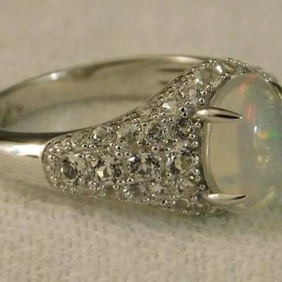 Ethiopian Welo Opal Size 9 Ring with Cambodian White Zircon Accents 
