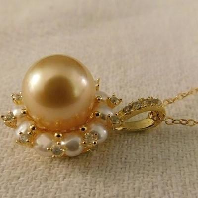 South Sea Pearl Set Including Necklace, Ring, and Earrings