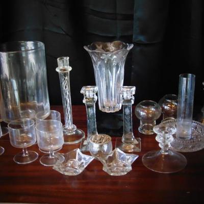 Assorted Candlesticks,Vase.Small footed glasses and more..