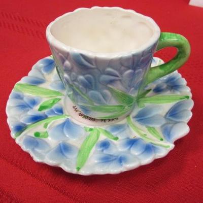 3 decorative tea cups and saucers