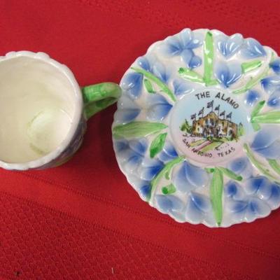 3 decorative tea cups and saucers