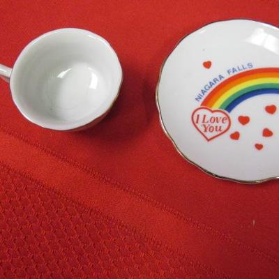 3 decorative tea cups and saucers