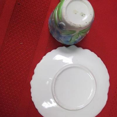 3 decorative tea cups and saucers