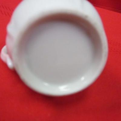 Decor saucer, 2 mini cream pitcher