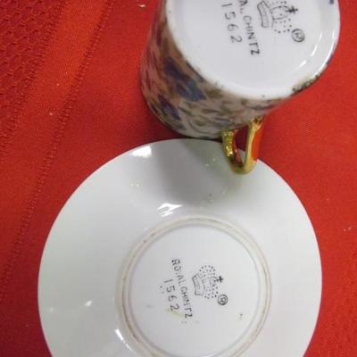 3 decorative tea cups and saucers