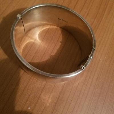 Antique English sterling silver bangle carved