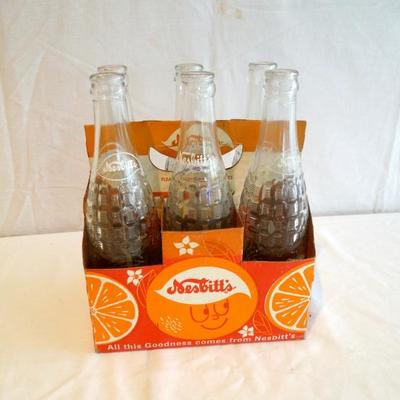 Lot 22  Six Pack of Nesbitt's Orange Soda 12 oz. Empty Pop Bottles 