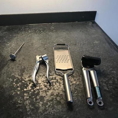 Set of one cocking temperature stick,nutcracker, food slicer,can opener  