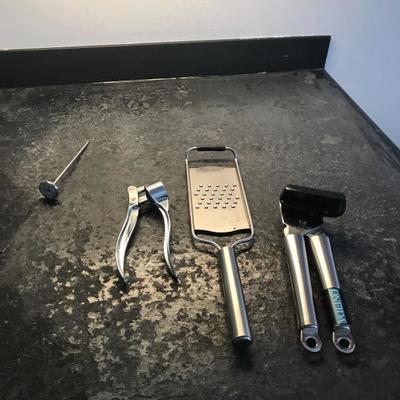 Set of one cocking temperature stick,nutcracker, food slicer,can opener  