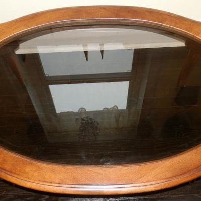 Solid Wood with Oval Smoked Glass Top Coffee table - Lot 115