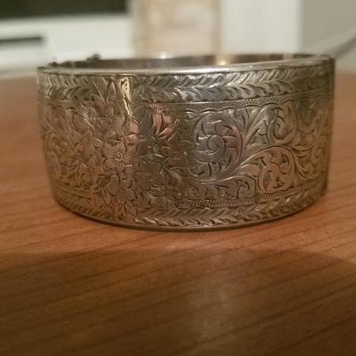 Antique English sterling silver bangle carved
