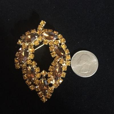 Beautiful amber colored vintage brooch