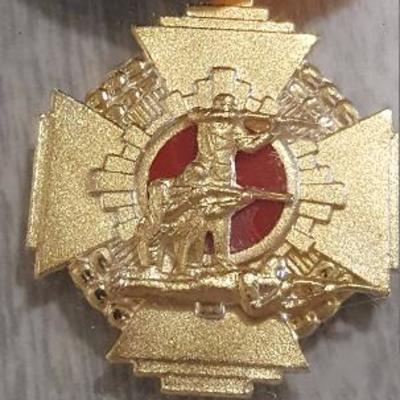 1960 Infantry Division Marksman medal encased in lucite.