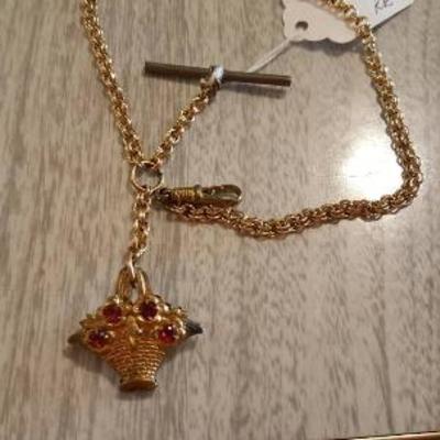 Vintage gold tone watch chain with flower basket pendant