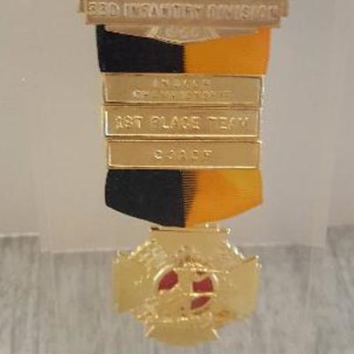 1960 Infantry Division Marksman medal encased in lucite.