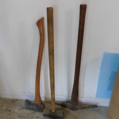 Set of Heavy Head Tools Including Sledge Hammer, Pick, and Ax