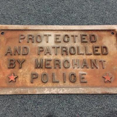  Circa 1930 Protected and patrolled by merchant police Metal sign