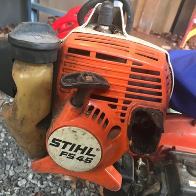 Lot 84 - Stihl Weed Eater and Husqvarna Blower 